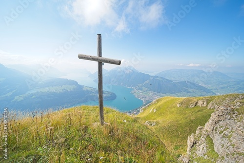 the ,,fronalpstock" summit cross in central switzerland, with nice views to the lake lucerne.