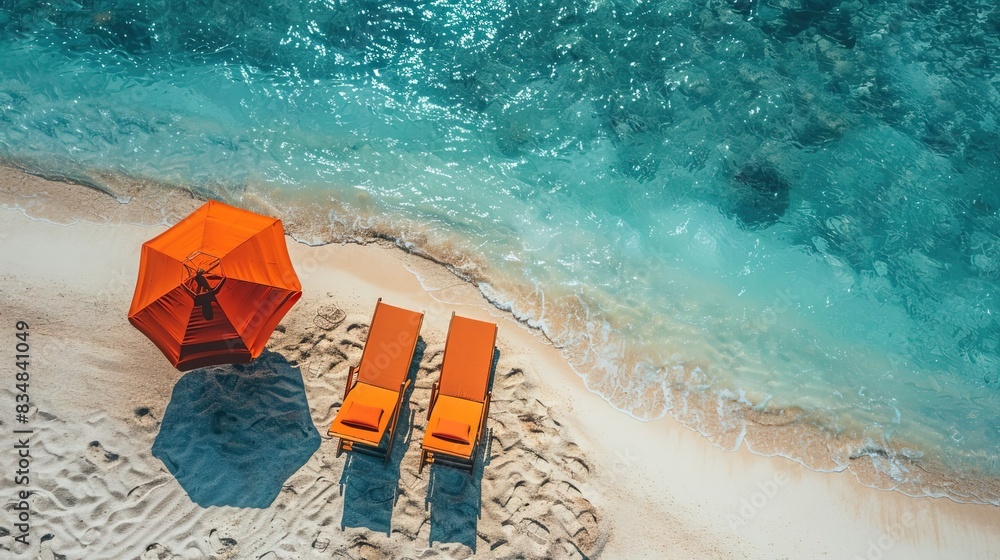 Naklejka premium Beach chairs, toys, umbrella with copy space. summer vacation concept