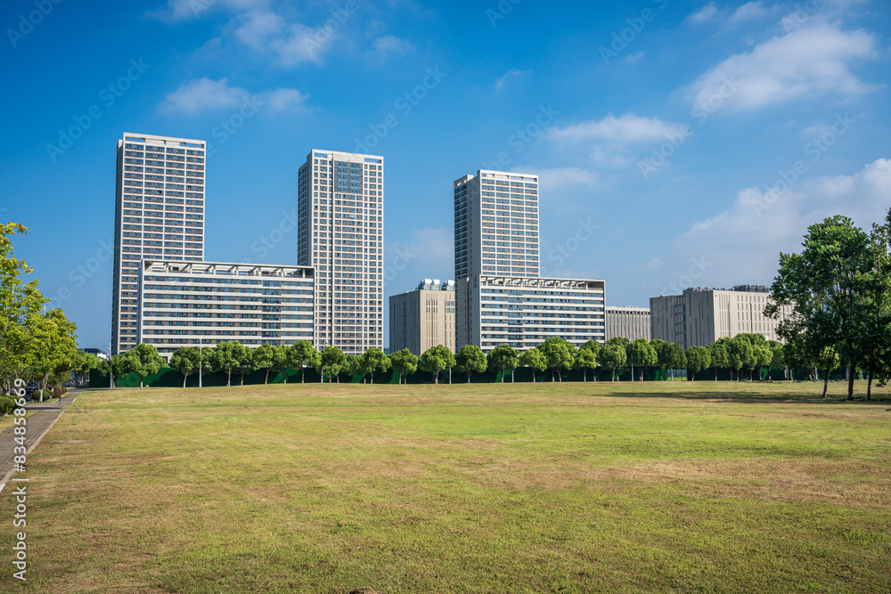Green lawn in front of modern business building Green lawn in front of modern business building
