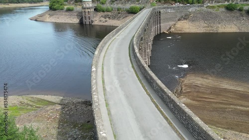 Aerial shot of Elan Valley, damn and road over lake and wier. photo