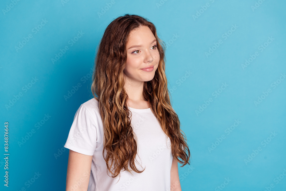 Photo of sweet adorable girl wear white stylish pajama look empty space isolated on blue color background Photo of sweet adorable girl wear white stylish pajama look empty space isolated on blue color background