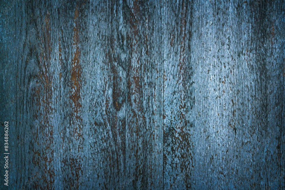 Fototapeta premium Vertical rustic wood planks with lots of texture in blue tones.