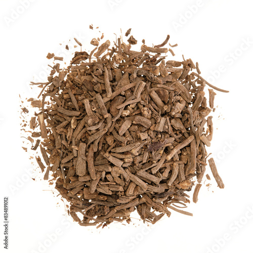 Overhead view of dried valerian root (Valeriana officinalis, Radix valerianae), isolated on white background
