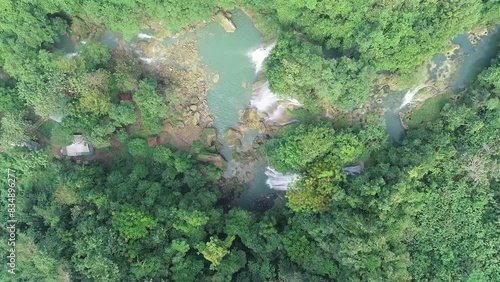 Aerial view of beautiful cikaso waterfall in green forest in jungle photo