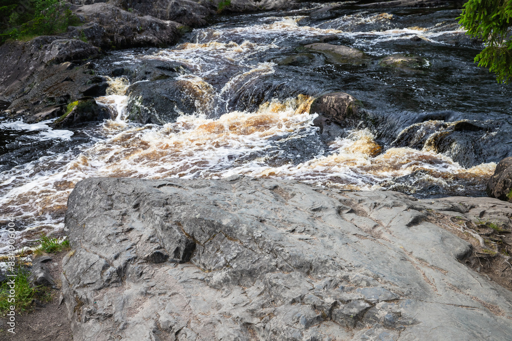 Fast stream water going over rocks. Waterfalls of Ruskeala Fast stream water going over rocks. Waterfalls of Ruskeala