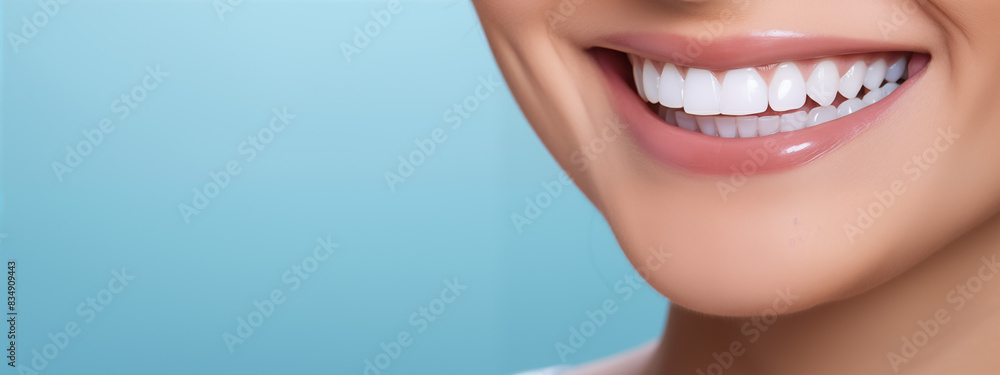 Obraz premium Beautiful Smile Closeup on Blue Background