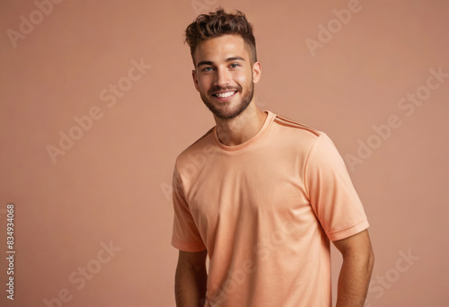 A happy soccer player in an Adidas orange jersey with a confident stance.