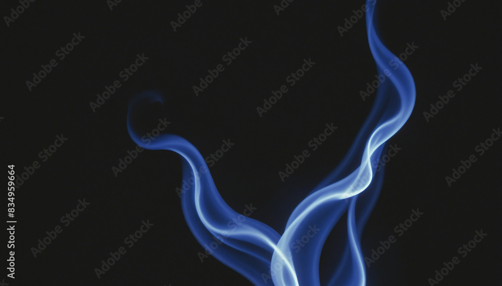 Fiery blue inferno against a pitch black canvas Fiery blue inferno against a pitch black canvas
