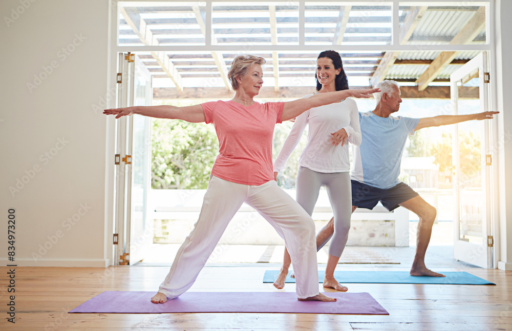 Yoga, fitness and mature couple with teacher for class, health and wellness in warrior pose. Workout, senior man and woman on mat for body care advice, balance and exercise together with instructor Yoga, fitness and mature couple with teacher for class, health and wellness in warrior pose. Workout, senior man and woman on mat for body care advice, balance and exercise together with instructor