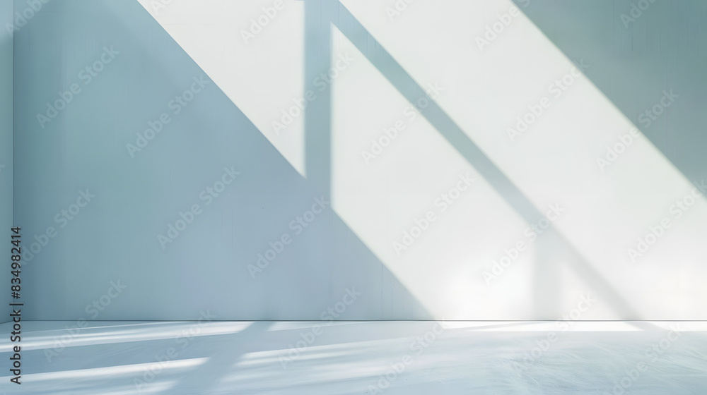 Fototapeta premium Light minimalist geometric background image in gray and light blue tones with light and shadow from window for product presentation.