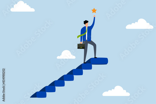 Hope to success in business, businessman climbs stairs to reach valuable star prize.