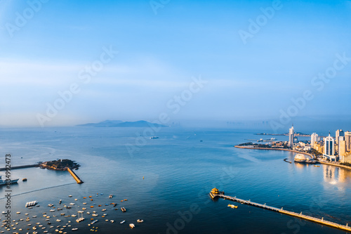 Fotografie High angle aerial photography of Qingdao Pier and urban skyline in Shandong, Chi