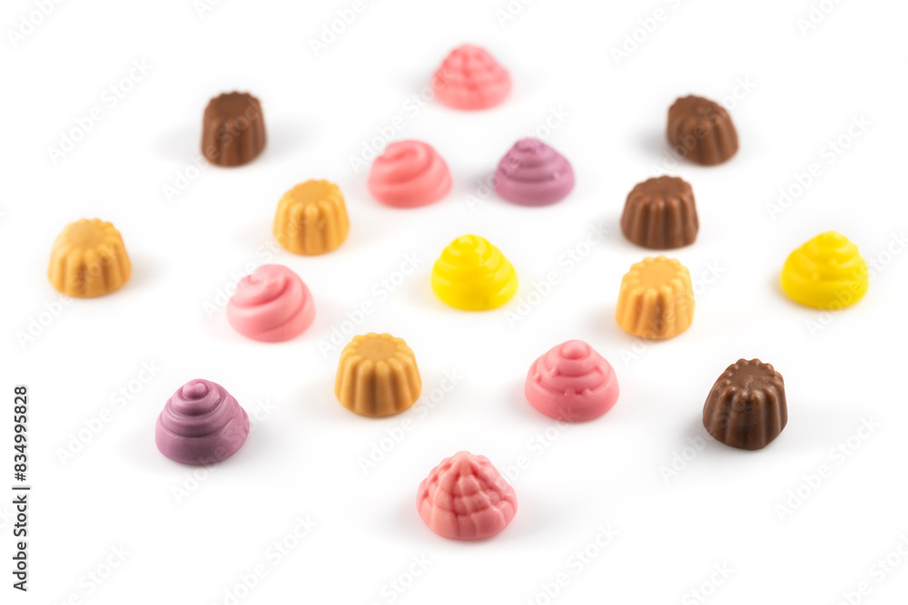 Set of delicious jelly candies in shape of meringue and cupcake on white background Set of delicious jelly candies in shape of meringue and cupcake on white background
