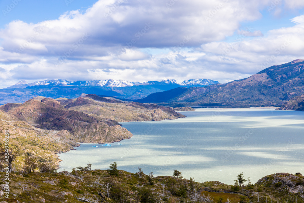 Fototapeta premium Torres del Paine national park in Patagonia Andes, Chile. South America mountain landscape. Beautiful mountains Los Cuernos, Torres del Paine and Paine Grande tower peaks near lake on a sunny day
