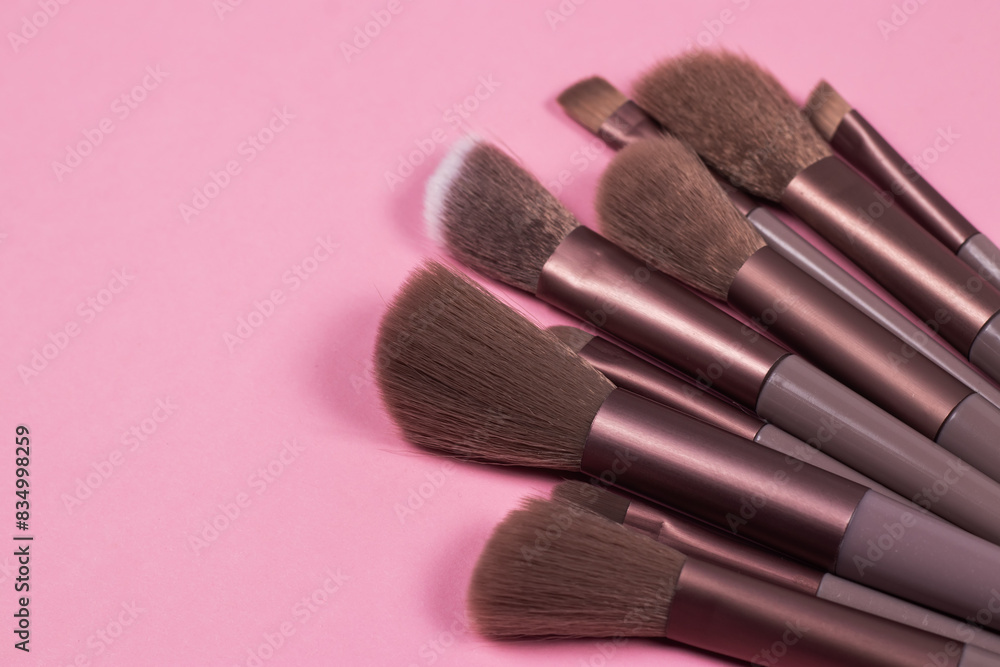 Professional make-up brush on pink background Professional make-up brush on pink background
