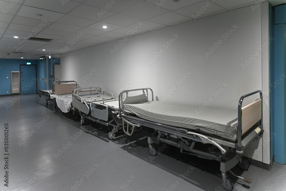 empty beds waiting for patients in a hospital empty beds waiting for patients in a hospital