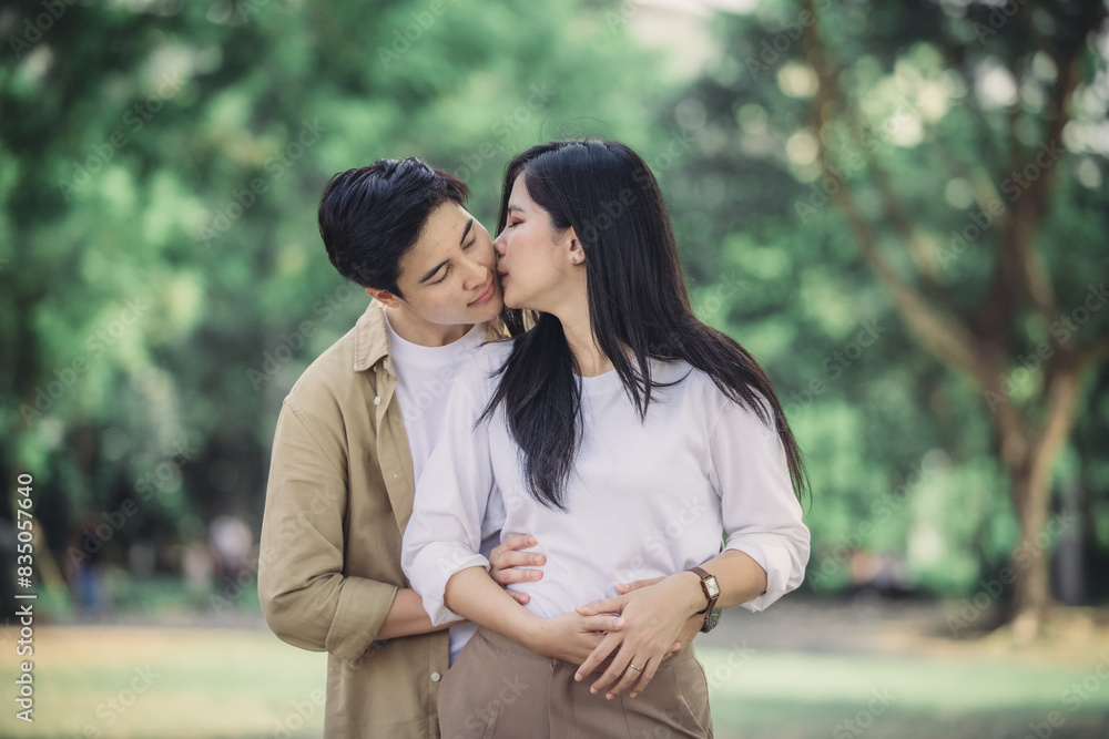 Lesbian couple sharing romantic love and care in public, celebrating joyful union as life partners. Lesbian couple sharing romantic love and care in public, celebrating joyful union as life partners.