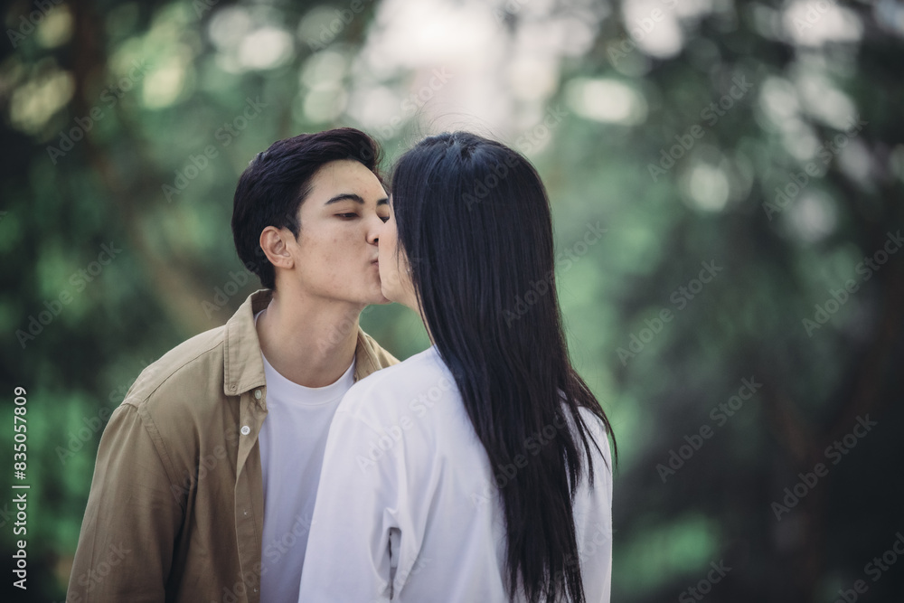 Lesbian couple sharing romantic love and care in public, celebrating joyful union as life partners. Lesbian couple sharing romantic love and care in public, celebrating joyful union as life partners.