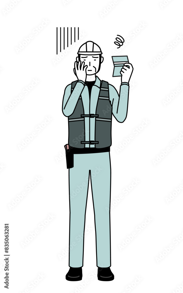 Senior male engineer in helmet and work wear looking at his bankbook and feeling depressed. Senior male engineer in helmet and work wear looking at his bankbook and feeling depressed.