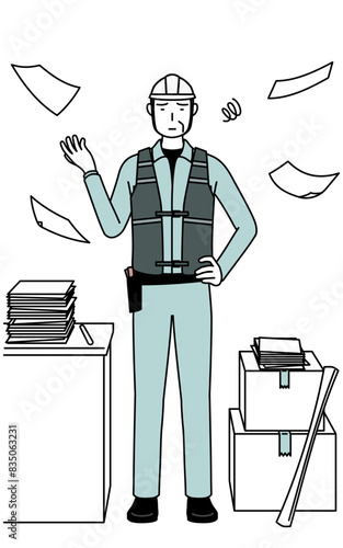 Senior male engineer in helmet and work wear who is fed up with his unorganized business.