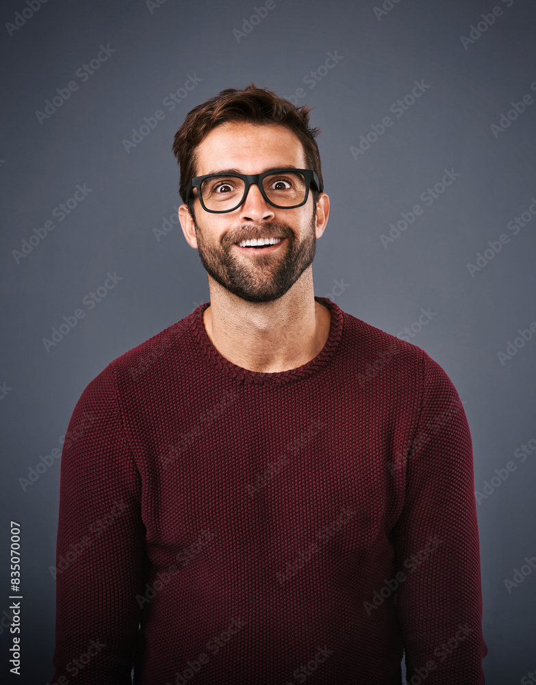 Studio, glasses and man with funny face, portrait and wellness with eye care, product or lens for vision. Gray background, silly or happiness for person, prescription and eyewear with fashion in USA Studio, glasses and man with funny face, portrait and wellness with eye care, product or lens for vision. Gray background, silly or happiness for person, prescription and eyewear with fashion in USA