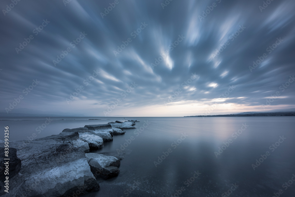 Fototapeta premium Storm on the lake: the rocks as imperturbable witnesses