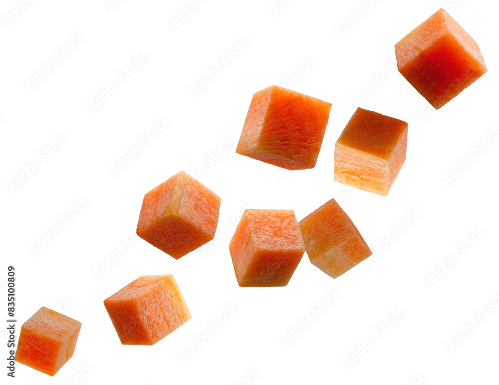 Carrot cubes fly in space forming a chain shape. Volumetric back light. Isolated on white Carrot cubes fly in space forming a chain shape. Volumetric back light. Isolated on white