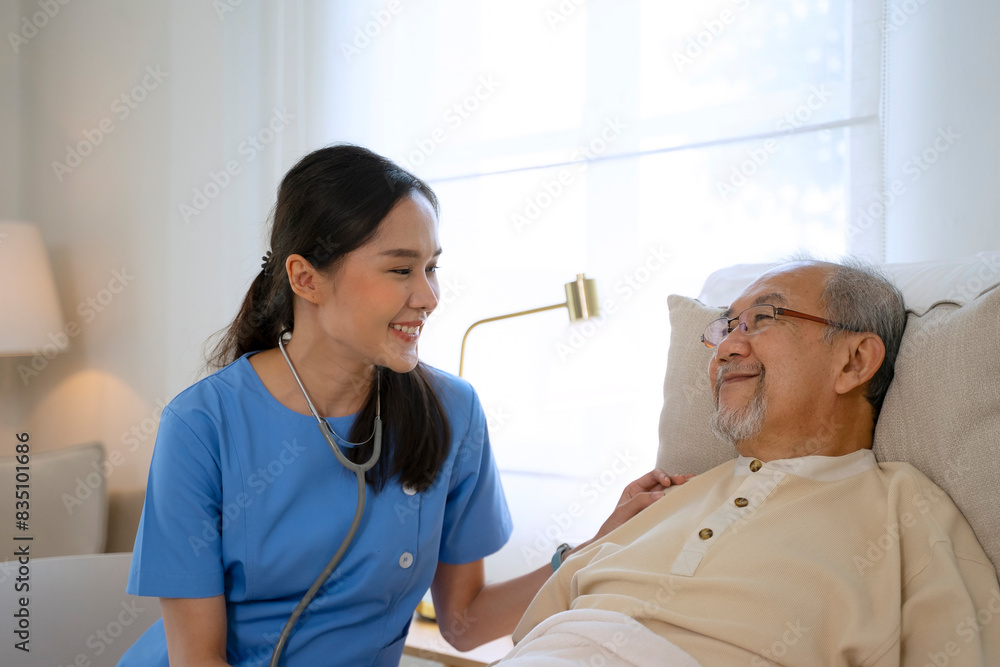 Fototapeta premium Female health care worker is take care senior man at home.