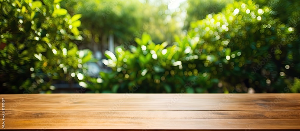 Outdoor wooden table with copy space image in a garden setting. Outdoor wooden table with copy space image in a garden setting.