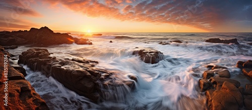 Sunset on the beach shore w...