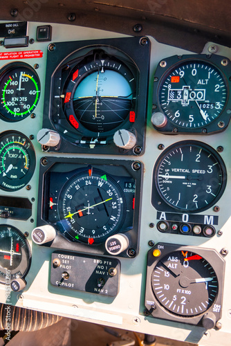 dials and gauges in a helicopter plane cockpit photo
