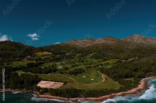 Club de Golf de Alcanada, Islas baleares. 27 de Febrero 2024 Golf from Alcanada, Alcudia Light House. photo