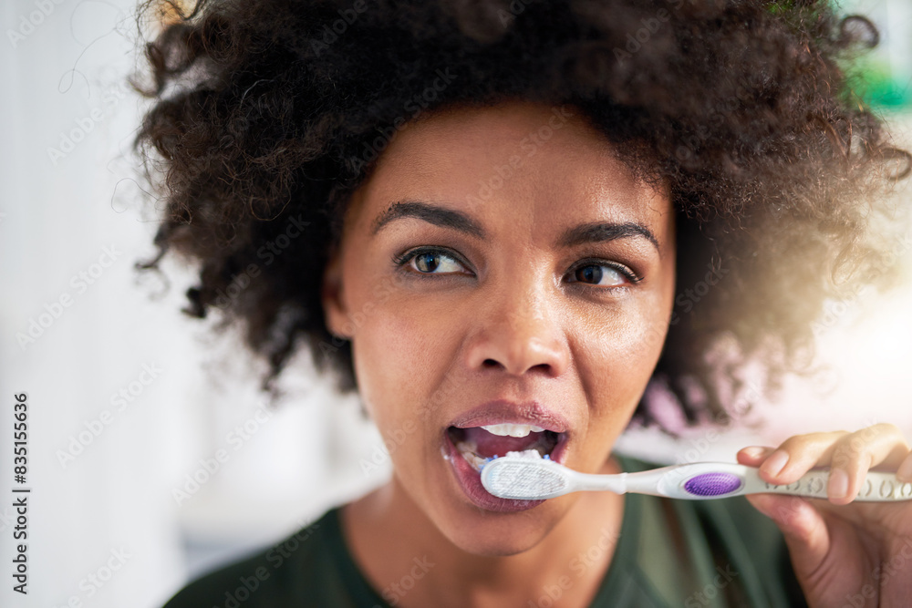 Obraz premium Dental care, black woman and toothbrush in bathroom for hygiene, oral health and cavity prevention in home. Female person, teeth whitening and morning routine for wellness, gum or protection