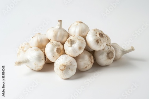 Pile of white garlic bulbs on a white background. Detailed macro photography. Garlic illustration for design and print. Generative AI