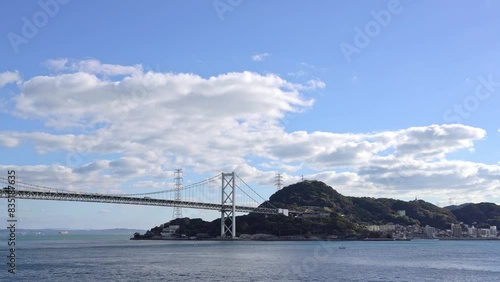 Shimonoseki Kanmon bridge and Kitakyushu Moji in Yamaguchi, Japan photo