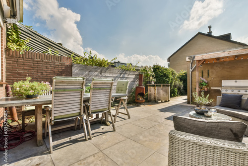 Sunny backyard patio setting in Rosendael, Amsterdam photo