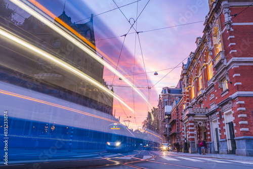 Tram trails along the Marnixstraat at twilight