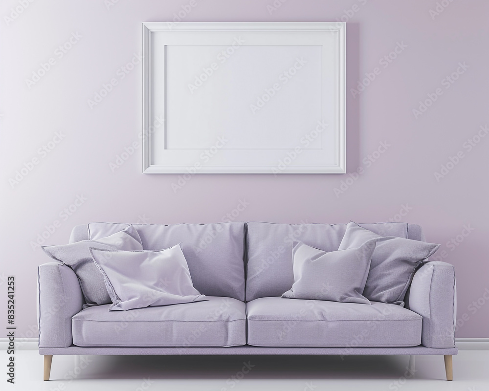 Fototapeta premium A serene living room with a muted lavender grey sofa and a pristine white frame on the wall, offering a tranquil ambiance.