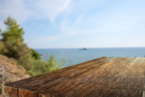 Desk of free space and summer ladnscape of beach and sea.  photo