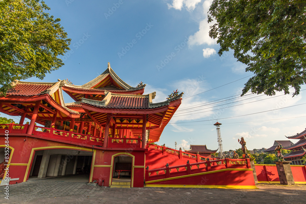 Cheng ho temple at semarang ; semarang tourism ; Majestic Traditional Temple Architecture Under a Clear Blue Sky, Framed by Lush Greenery Cheng ho temple at semarang ; semarang tourism ; Majestic Traditional Temple Architecture Under a Clear Blue Sky, Framed by Lush Greenery