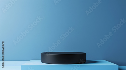 A black pedestal sits on a blue base