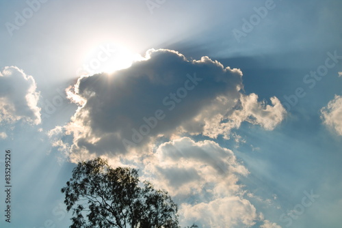 Sun bursting through clouds
