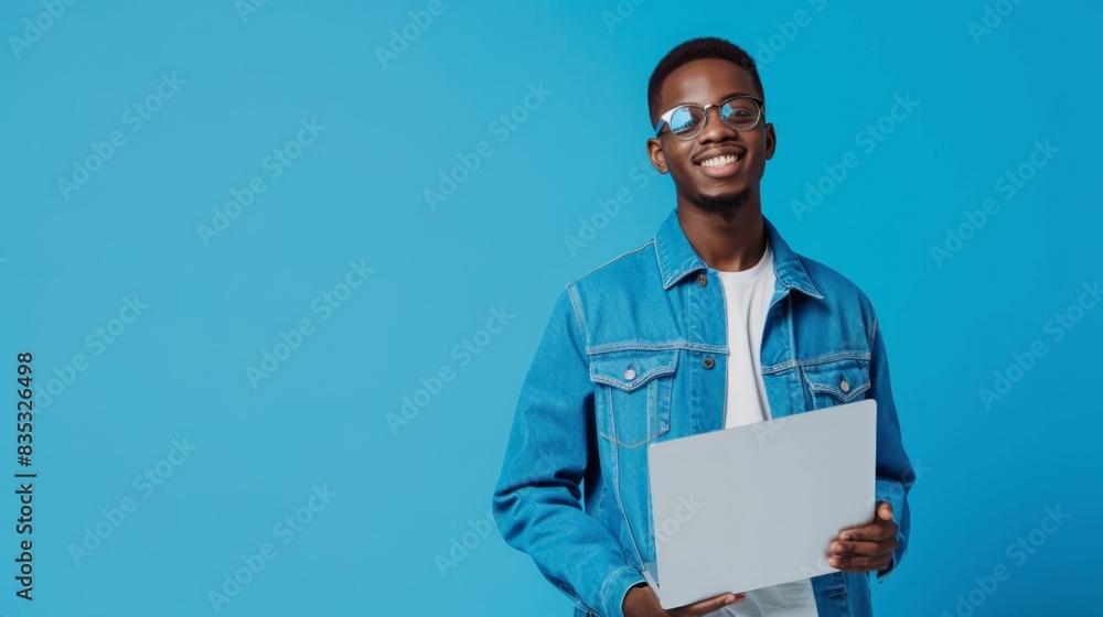 The man holding laptop The man holding laptop