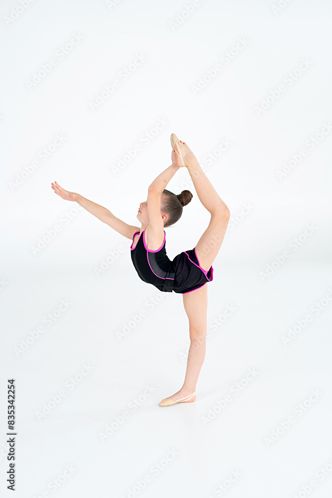 little gymnast athlete girl doing exercise