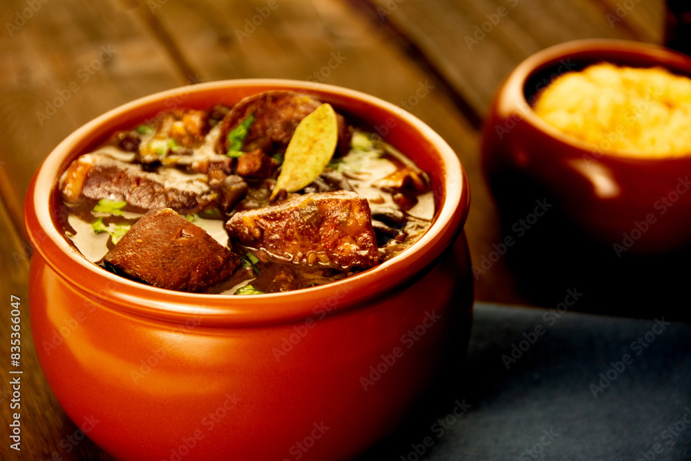 Brazilian Feijoada Food black bean stew with bacon and pork sausage Brazilian Feijoada Food black bean stew with bacon and pork sausage