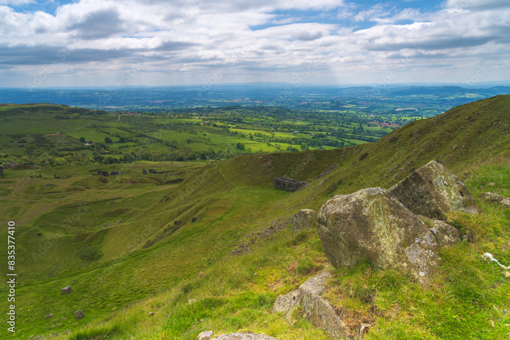 View from the summit of Titterstone Clee looking over the fields and countryside of Shropshire, UK towards the Welsh border View from the summit of Titterstone Clee looking over the fields and countryside of Shropshire, UK towards the Welsh border