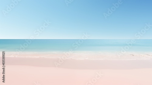 Serene Coastal Landscape Featuring a Clear Blue Sky and Gentle Waves on a Sandy Shoreline