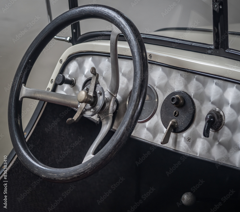 Dashboard and steering wheel of old-timer car Dashboard and steering wheel of old-timer car