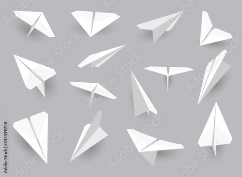 Paper planes collection. Origami handmade aircraft set in different view. Vector white model paper airplanes with shadow, isolated on gray background