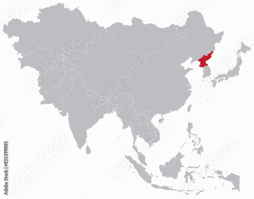 Highlighted red map of NORTH KOREA inside grey detailed blank political map of Asia on light blue background, without the Middle East and Russia